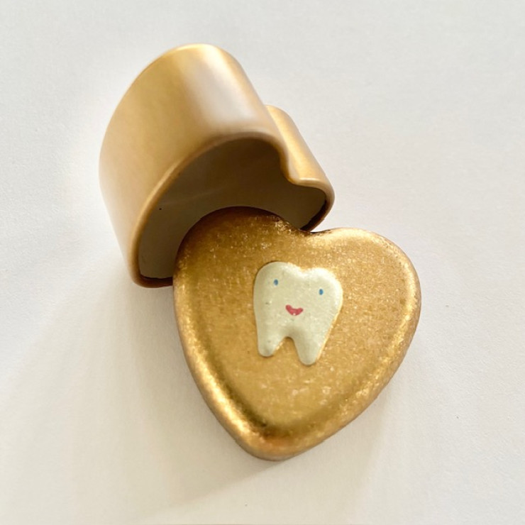 Æske til mælketænder - i guld